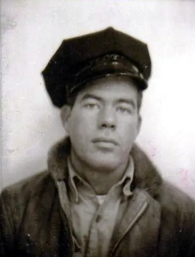 Vintage black-and-white portrait of Robert Boyd wearing a peaked cap and a jacket with a fur collar.